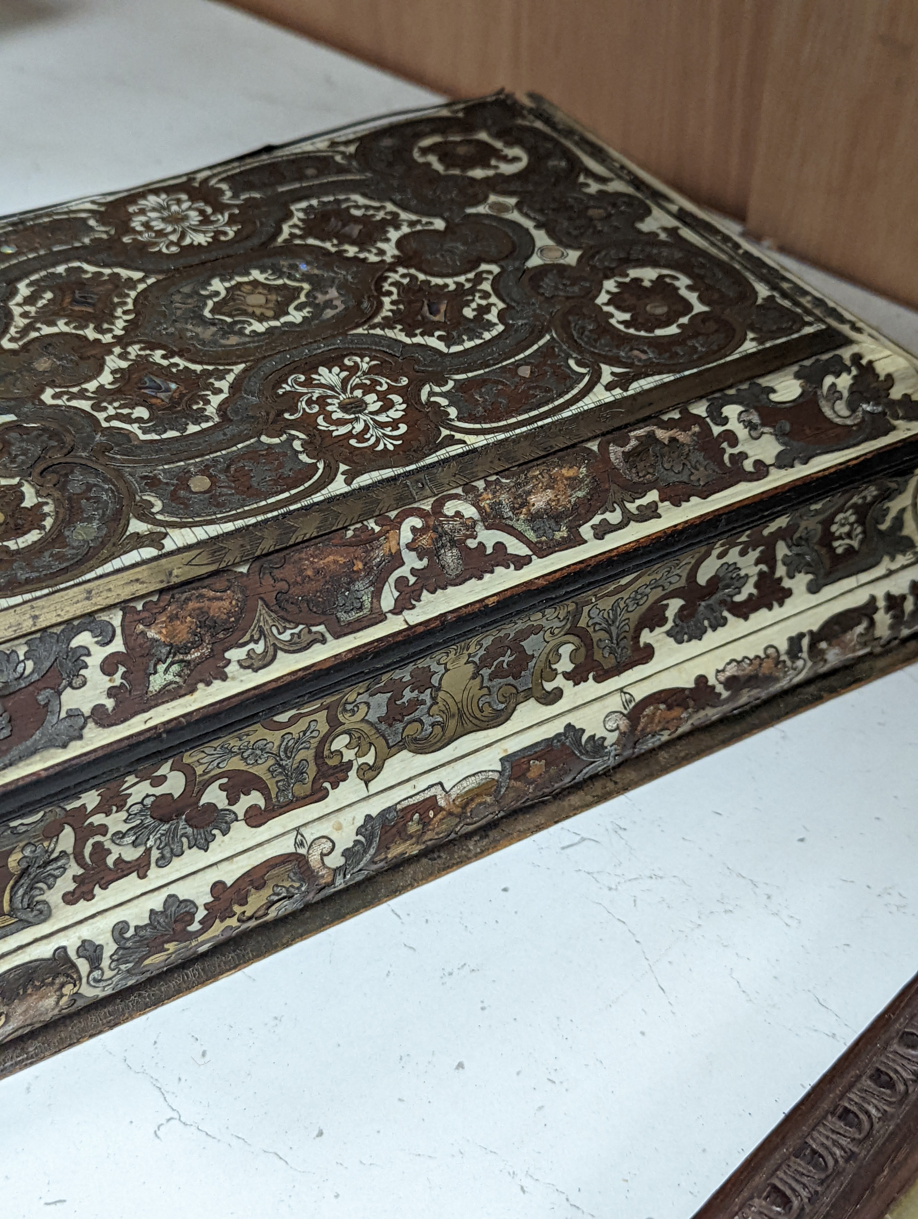 A 19th century French cut brass pewter and ivory inlaid jewellery box, h 10cm, 27 x 19cm, together with a parquetry box (2)